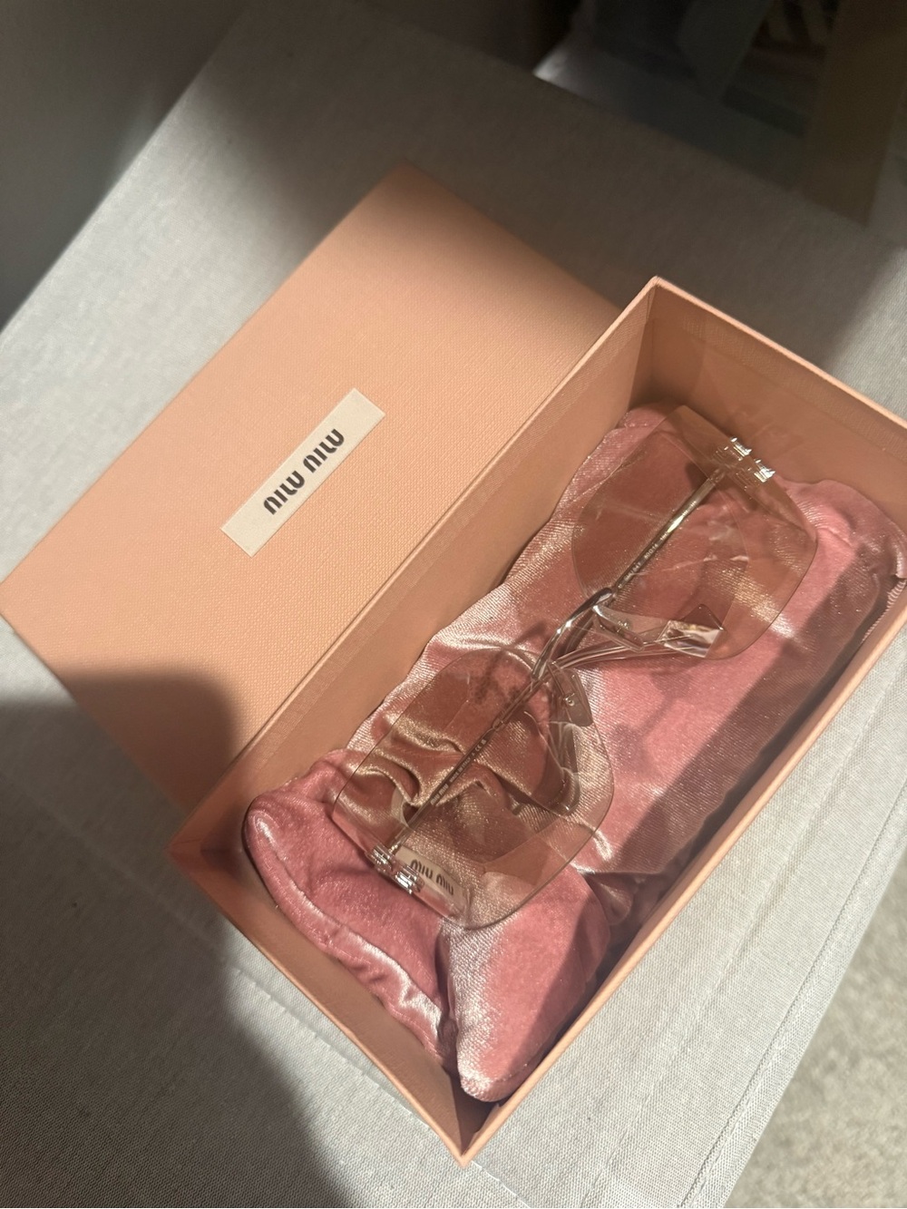 Miu Miu Transparent Pink-Tinted Oversized Sunglasses